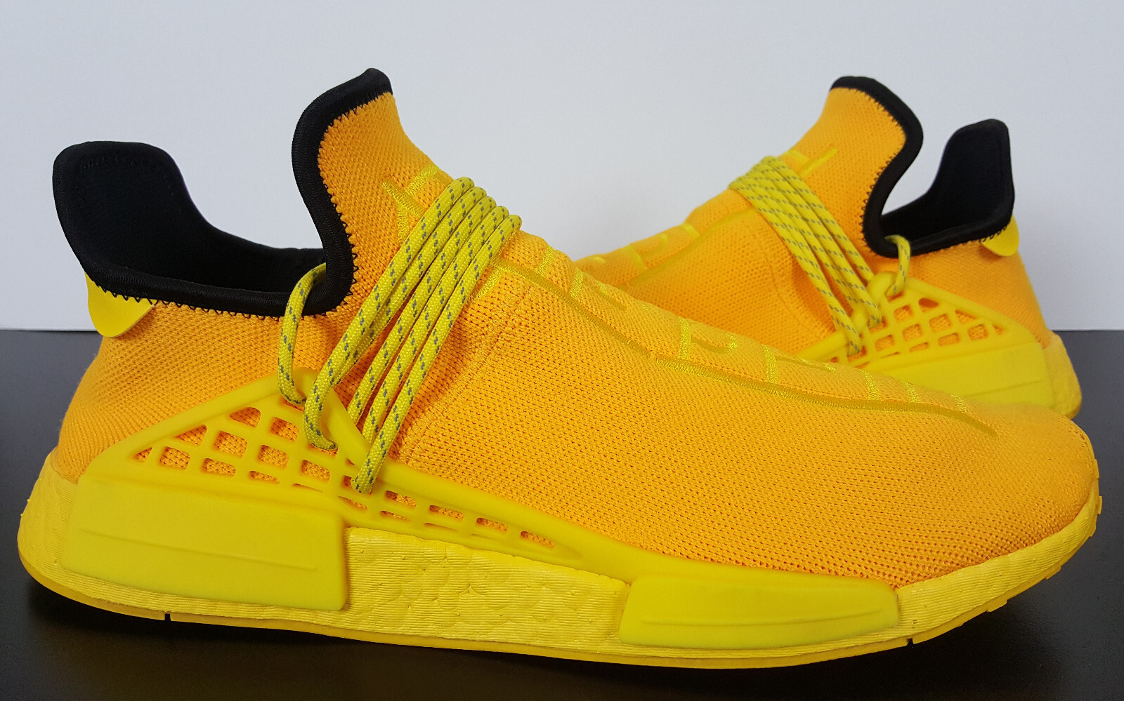 human race black with yellow laces